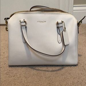 Small white Coach satchel